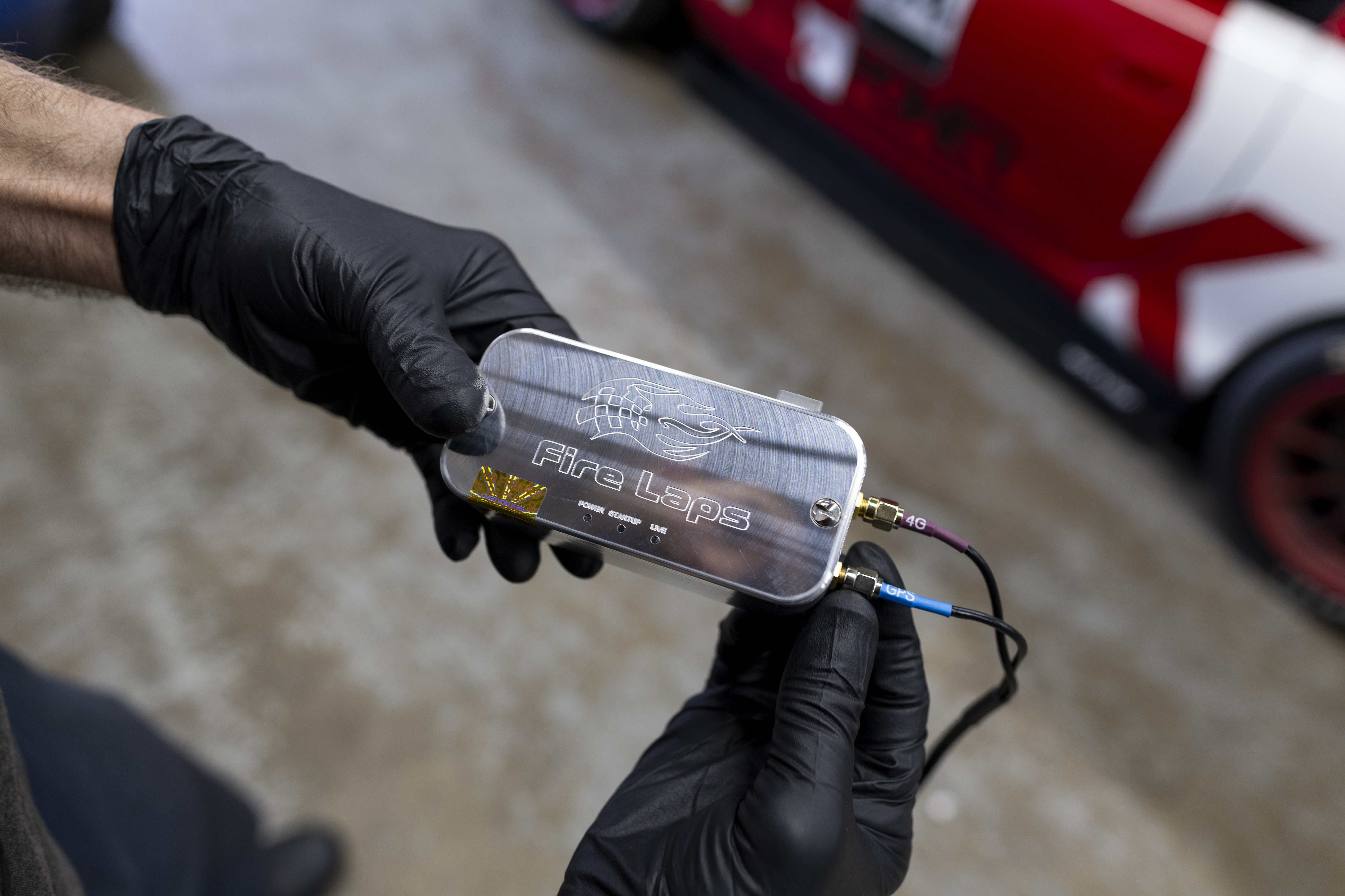 Fire Laps Fire Link 6061 billet aluminum GPS datalogger with LTE and GPS antennas